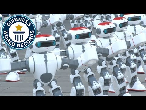 A crowd of dancing robots: a new world record
